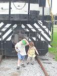 My kids running from a train at the railroad museum in Savannah.