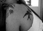 3rd tattoo- 2 swallows