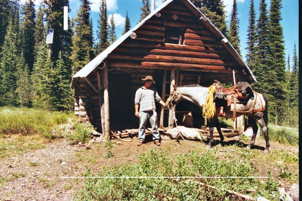 Snow Cabin & a friend i took up there last year & Skookum me horse