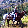 My Great Wife Hunter on her mare Aimy and leading Willow by montana