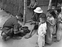 treating villagers2 vietnam 1965 small